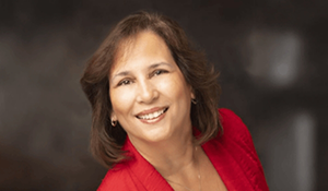 Smiling woman in a red blouse