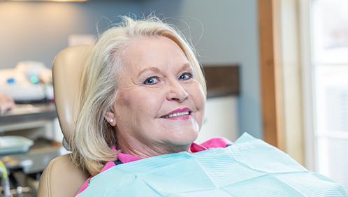 Woman smiling in the dental chair
