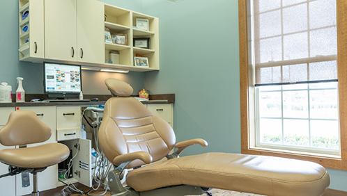 Empty dental exam chair