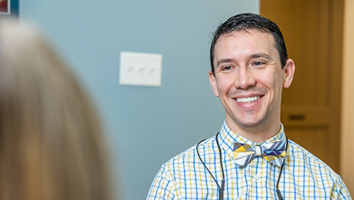 Doctor Parry smiling at a patient