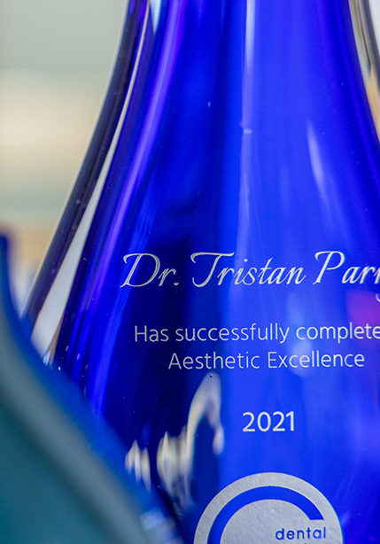 Close up of a plaque that reads Doctor Tristan Parry has successfully completed dental excellence 2021