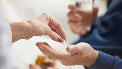 Person taking a pill