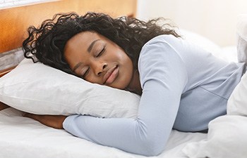 Woman resting in bed