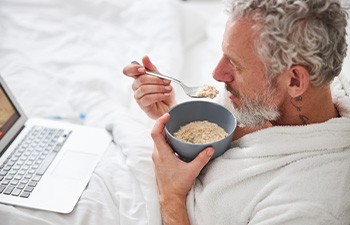 Man eating oatmeal