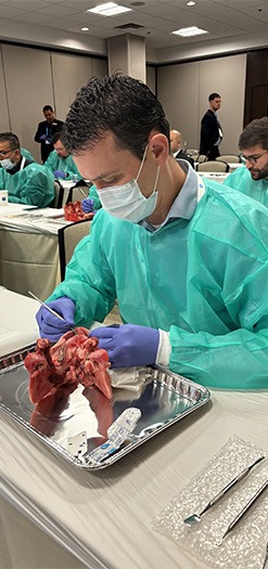 Dr. John Kois working in the lab with tissue